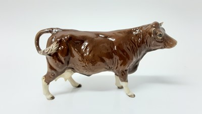 Lot 94 - Beswick BCC Limousin Bull, model no. 2463, designed by Alan Maslankowski, together with a BCC Limousin cow and calf (3)