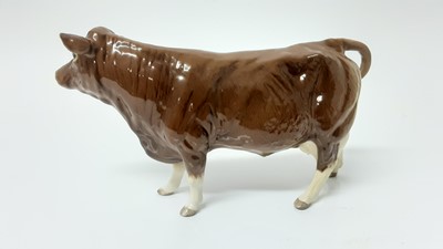 Lot 94 - Beswick BCC Limousin Bull, model no. 2463, designed by Alan Maslankowski, together with a BCC Limousin cow and calf (3)