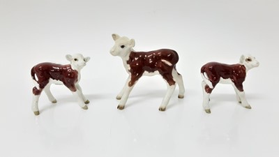 Lot 95 - Three Beswick Hereford calves including model no. 901B and 1406B, all designed by Arthur Gredington