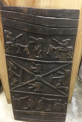 Lot 134 - African antique Dogan carved grain store door