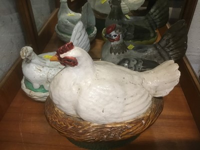 Lot 164 - 19th century majolica hen form egg basket, two others