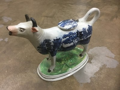 Lot 600 - 19th century transfer printed cow creamer