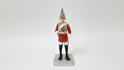 Lot 126 - Royal Doulton Iconic London figure - Lifeguard HN5364,  together with a Royal Doulton dog, and another RoyalDoultonfigure - Teatime HN2255 (3)