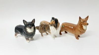Lot 127 - Three Beswick dogs - Black Prince, model no. 1299A, designed by Arthur Gredington, 14cm high, Corgi, model no. 1299B, designed by Arthur Gredington, 14cm high, and Rough Collie, model no. 3129, des...