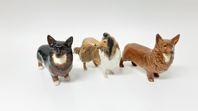 Lot 129 - Three Beswick dogs - Black Prince, model no. 1299A, designed by Arthur Gredington, 14cm high, Corgi, model no. 1299B, designed by Arthur Gredington, 14cm high, and Rough Collie, model no. 3129, des...
