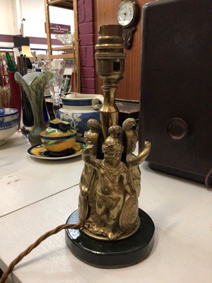 Lot 275 - Victorian brass lamp with three putti dressed as Roman centurions, on painted wooden base