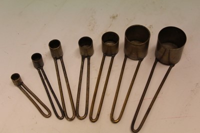 Lot 964 - Group of brass shot measurers and powder drams (qty)