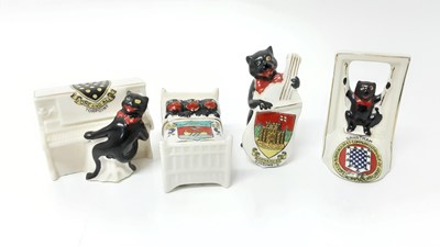 Lot 147 - Four Arcadian Crested China Black Cats - Torpoint, Grantham, Sandown Isle of Wight and Bowness