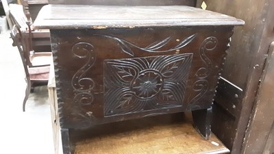 Lot 882 - Antique oak miniature coffer with rising lid and carved front on shaped end standards