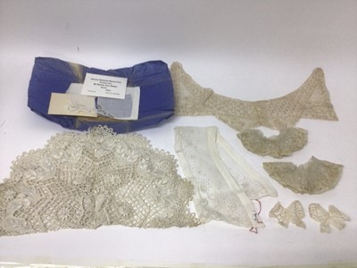 Lot 2209 - Selection of antique lace items including Maltese silk floss collar, bobbin lace tea cosy cover, pulled thread work bib, embroidered net lace dress front, similar pair of lace cuffs and bonnet veil...