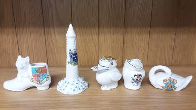 Lot 167 - Selection of Crested China models including Policeman, Boy Scout, Lighthouse etc, various manufacturers to include Carlton, Willow Art and Shelley