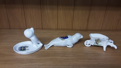 Lot 167 - Selection of Crested China models including Policeman, Boy Scout, Lighthouse etc, various manufacturers to include Carlton, Willow Art and Shelley