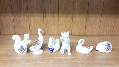 Lot 167 - Selection of Crested China models including Policeman, Boy Scout, Lighthouse etc, various manufacturers to include Carlton, Willow Art and Shelley