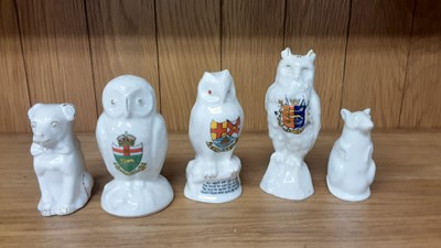 Lot 167 - Selection of Crested China models including Policeman, Boy Scout, Lighthouse etc, various manufacturers to include Carlton, Willow Art and Shelley