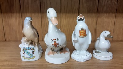 Lot 167 - Selection of Crested China models including Policeman, Boy Scout, Lighthouse etc, various manufacturers to include Carlton, Willow Art and Shelley