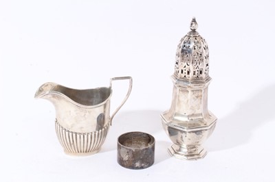 Lot 290 - Silver castor, milk jug, napkin ring