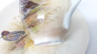Lot 1245 - Royal Worcester cabinet cup and saucer, hand decorated with Teal, signed Jas Stinton