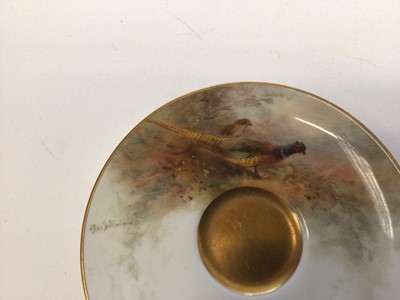 Lot 1249 - Royal Worcester cabinet cup and saucer, hand decorated with a Pheasant, signed Jas Stinton
