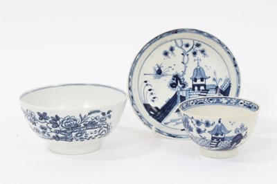 Lot 139 - 18th century Lowestoft porcelain blue and white tea bowl and saucer with painted temple and landscape, together with a similar bowl with transfer printed fence pattern
