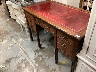 Lot 925 - Edwardian Edwards and Roberts desk with leather lined top, seven drawers on pillar supports  122 cm wide