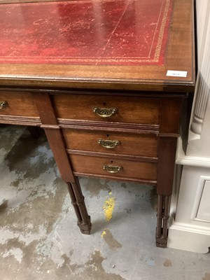 Lot 925 - Edwardian Edwards and Roberts desk with leather lined top, seven drawers on pillar supports  122 cm wide