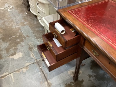 Lot 925 - Edwardian Edwards and Roberts desk with leather lined top, seven drawers on pillar supports  122 cm wide