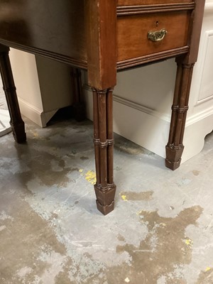 Lot 925 - Edwardian Edwards and Roberts desk with leather lined top, seven drawers on pillar supports  122 cm wide