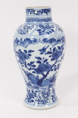 Lot 137 - 18th/19th century Chinese porcelain baluster form vase with painted underglaze blue floral panels