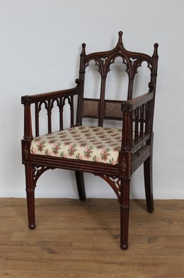 Lot 1428 - Regency Gothic oak elbow chair with drop-in seat, architectural elements, on 
multiple column front legs