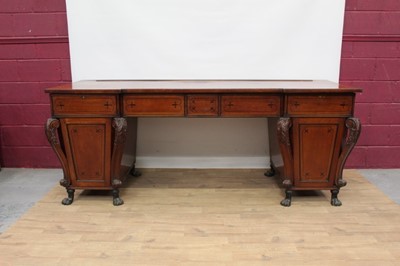 Lot 1430 - Impressive Regency mahogany breakfront twin pedestal sideboard with ebony 
and line inlaid decoration, carved scroll supports, on paw feet