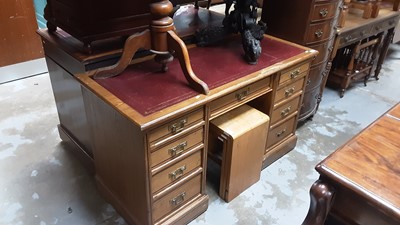 Lot 995 - Late Victorian oak and ebony strung kneehole desk with leather lined top and nine drawers