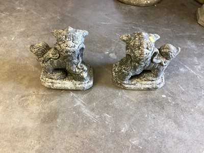Lot 1036 - Pair of concrete garden dogs of foo, 25cm high
