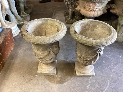 Lot 1037 - Pair of concrete garden urns, 41.5cm diameter, 57.5cm high