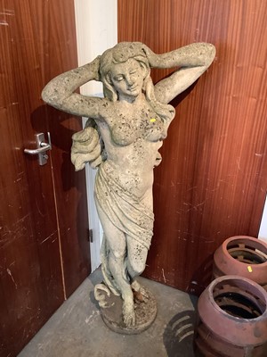 Lot 1039 - Large concrete statue of a semi clad female, 152cm high