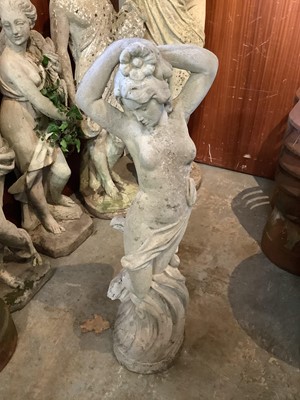 Lot 1042 - Concrete garden statue of a semi clad lady, 90cm high