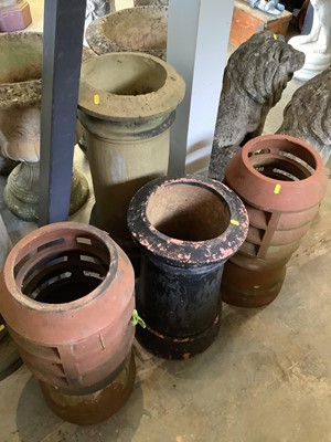 Lot 1045 - Selection of five Victorian and later terracotta chimney pot, largest 77cm