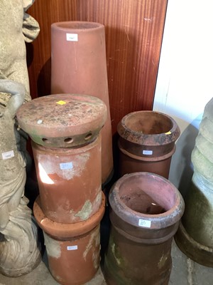 Lot 1047 - Five Victorian and later terracotta chimney pots, largest 99cm high