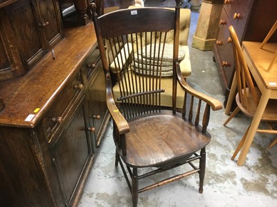 Lot 1058 - Early 20th century American oak stick back chair