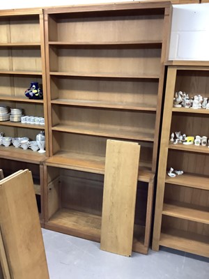 Lot 1072 - Pair of oak two height open bookcases, 115cm wide, 33cm deep, 224cm high