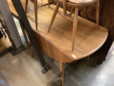 Lot 1105 - Ercol drop leaf dining table, together with a set of four Ercol stick back elbow chairs