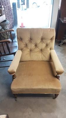 Lot 1106 - Good quality Victorian low armchair on turned front legs and brass castors