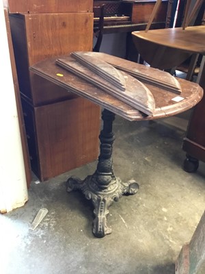 Lot 1145 - Victorian cast iron pub table with dolphin support and piano stool