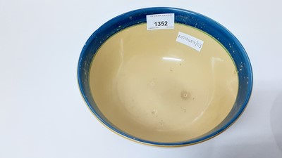 Lot 1352 - Two Clarice Cliff for Liberty's 'Bizarre' bowls with polychrome painted horizontal stripes, signed 'Liberty's' and printed Bizarre mark. 19cm and 21cm diameter (2)