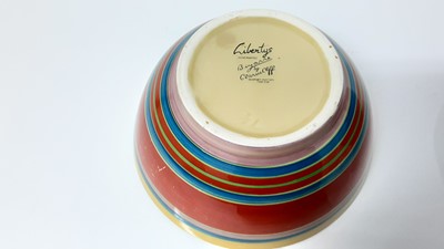 Lot 1352 - Two Clarice Cliff for Liberty's 'Bizarre' bowls with polychrome painted horizontal stripes, signed 'Liberty's' and printed Bizarre mark. 19cm and 21cm diameter (2)