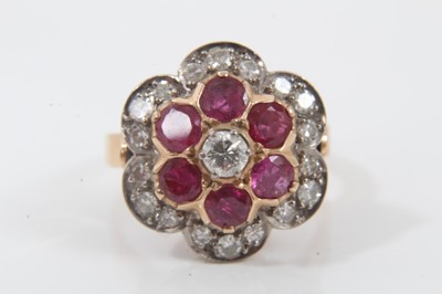 Lot 203 - Ruby and diamond flower head cluster ring