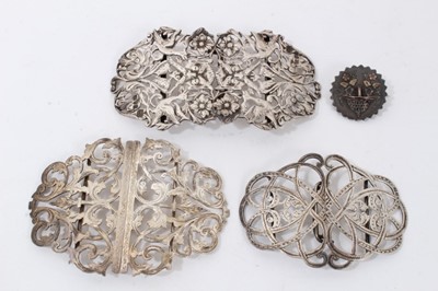 Lot 188 - Three silver nurse’s buckles together with a Victorian silver brooch