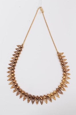 Lot 137 - Indian yellow metal fringe necklace with faceted gold bead decoration