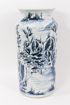 Lot 183 - Large Oriental blue and white porcelain sleeve vase, decorated with landscape scenes