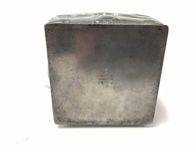 Lot 2675 - Art Nouveau Tudric pewter tea caddy/biscuit box and cover designed by Archibald Knox for Liberty, of square form with stylized flowers and leaves in grid formation, signed and numbered 0194, approx...
