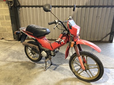Lot 2073 - 1985 Honda PXR 50cc scooter / moped, finished in red, reg. no. B384 BNM, 213 miles indicated, in barn find condition, for restoration.  
N.B. keys present, no V5 or paperwork